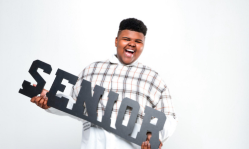  Palisades High senior Ashton Mitchell poses with a senior sign